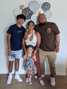 Scholarship winner, Daniel Ibarra, his wife, son, and daughter.